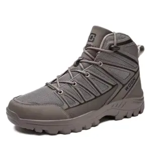 A gray high-top PU warm snow boot with mesh and synthetic overlays, thick treaded rubber sole, and lace-up closure is shown on a white background—ideal for OEM/ODM; wear-resistant, anti-slip hiking shoes for men.