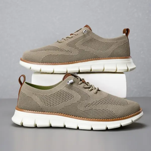 A pair of Big Size Men's Lace up Light Weight Fashion Hollow Out Breathable Flying Weaving Sports Shoes with EVA soles shown against a gray background.