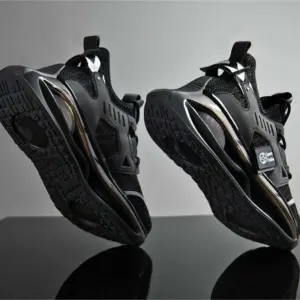 A pair of Wholesale Breathable Athletic Fitness Jogging Tennis Shoes Sport Running Sneakers for men with chunky soles, made by an OEM ODM manufacturer, are upright on a gray background highlighting the tread and side details.