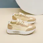 A pair of beige and white OEM ODM durable, wearable, breathable low top women's sneakers with white laces and chunky soles, designed for outdoor walking, wear-resistant, and available for customization.