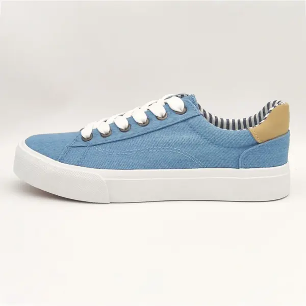 New Arrivals Wholesale Band Vulcanized Fashion Leather Casual Canvas Shoes for Men shown in light blue with white laces, white sole, tan heel patch, and striped inner lining—perfect for OEM/ODM customization.