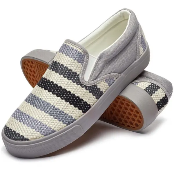 Fashion Ladies Comfortable Low Tops Stripe Printed Canvas Shoes for women feature woven uppers with black, blue, and white stripes, grey trim, rubber soles with brown textured outsoles—available for OEM/ODM customization.