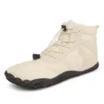 A stylish beige snow boot with a black rubber sole and toggle lace closure, perfect for OEM or ODM customization—Factory Wholesale Direct Sale Fashion Outdoor Men Women Cold Resistant Soft Cotton Shoes.