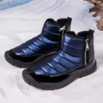 New Down Fabric Waterproof Snow Boots for men feature double side zippers, quilted design, and black textured soles. These thickened, warm outdoor short boots are available for OEM/ODM customization.