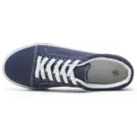 The XRH Wholesale Custom Logo Canvas Sneaker, a classic men's casual fashion shoe in navy blue with white laces and sole, is shown from above on a white background—perfect for OEM/ODM customization.