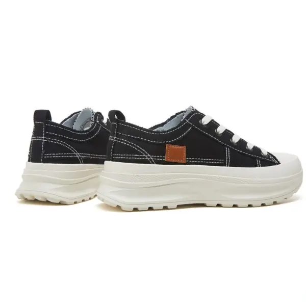 A pair of Fashion Chunky Platform Casual Canvas Sneakers in white with custom logo, designed for women and men, shown from the side and slightly behind on a plain white background.