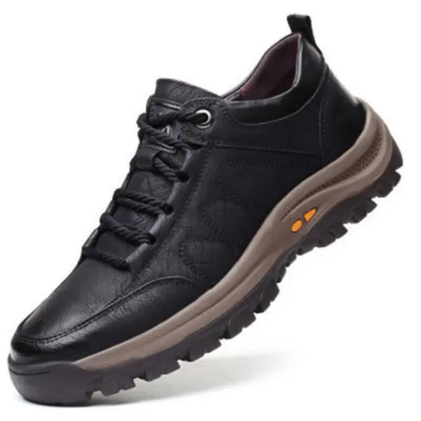 Men's solid faux leather lace-up sneakers in black with brown accents, thick rugged sole, and low-cut design—ideal for daily wear; available for OEM/ODM customization.