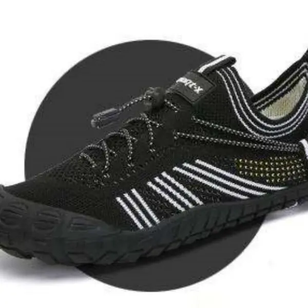 A black minimalist Customized Anti-slip Quick Drying Outdoor Shoe with white stripes, mesh upper, elastic laces, and textured rubber sole is displayed on a dark circular background—ideal for OEM ODM customization.