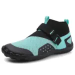 The OEM ODM Outdoor Wholesale Beach Flats Fishing Fitness Waterproof Sport EVA Breathable Water Shoes feature a teal and black mesh upper, black rubber sole, adjustable strap, and pull loops—ideal for customization.