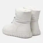 A pair of wholesale OEM/ODM plush thick genuine leather waterproof bread cotton fur winter boots for women, shown from the back and side, featuring textured rubber soles and a slightly slouched upper—perfect for customization.
