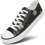 A blue low-top women's walking-style canvas shoe with custom options—ideal for OEM/ODM. Shown at an angle on a white background, this new style features casual design for ladies and women.