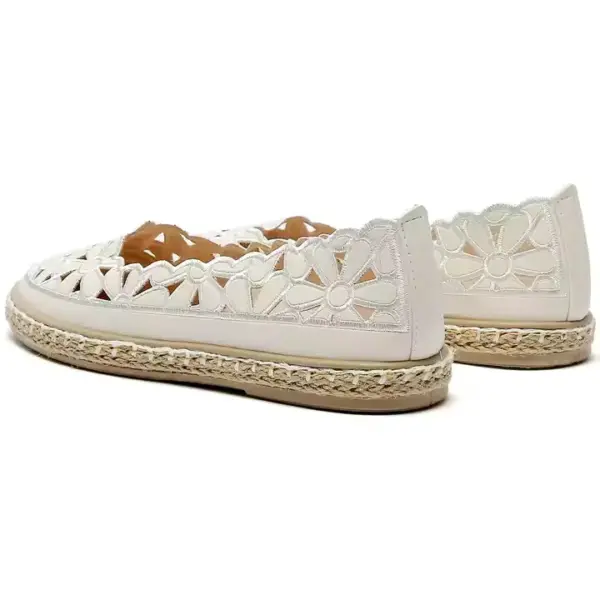 A pair of Office Round Toe Dress Flat Shoes in white, featuring slip-on style with floral cutouts and braided jute soles, displayed from a rear side angle.