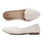 A pair of Flat Shoes Ballet Flat for Ladies Office in white is shown; one shoe is seen from the side and the other from above, highlighting their perforated slip-on design.