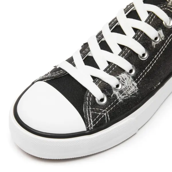 Close-up of a blue women's casual canvas shoe—Wholesale Custom Made Walking Style, ideal for OEM or ODM customization needs. Perfect for ladies seeking new style and comfort.