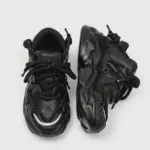 A pair of 2024 Fashion Breathable Mesh Casual Wholesale Sports Running Sneaker Fitness Walking Style Shoes for Men in black with chunky soles and large laces, displayed on a plain light gray background.