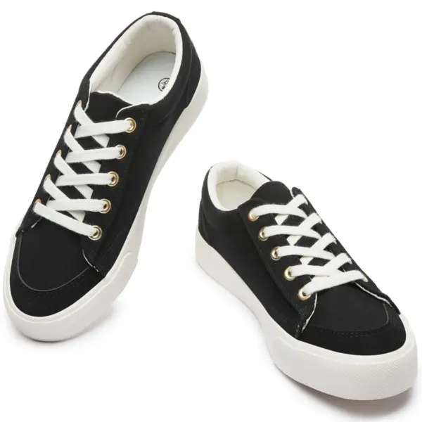 A pair of Wholesale Custom Classic Denim Upper Lace-Up Round Toe Men's Casual Sport Walking Canvas Shoes, black with white soles and laces, displayed on a white background.