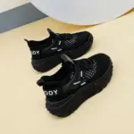 A pair of 2025 summer low-price mesh round toe women's sneakers with lace-up design and "PRODDY" lettering, featuring thick textured soles—available for OEM/ODM customization.