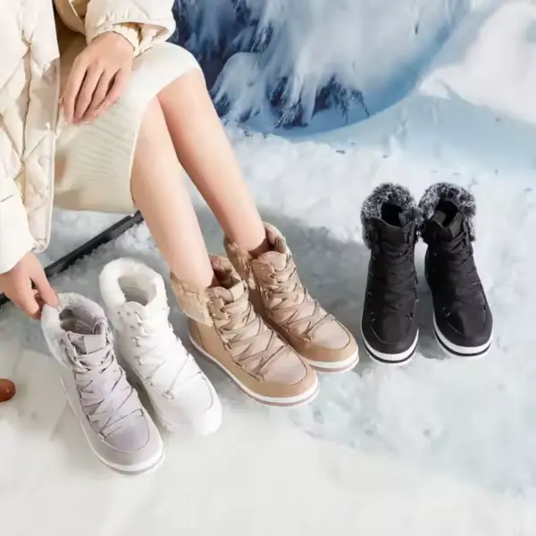 A person sits on snow in a light outfit, with four pairs of grey, white, beige, and black Women's Leather Sports Ankle Sneakers Boots—customizable logo, waterproof, outdoor-ready, and fur-lined for warmth—lined up beside them.
