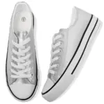 A pair of Hot Sale customizable PU upper women's canvas shoes with white rubber soles, black stripe accents, and white toe caps—lightweight and trendy, shown from top and side views; perfect for OEM/ODM customization.