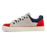 The Customizable Retro Mixed Stylish Plush Walking Sneakers feature a beige suede upper, red toe and heel accents, navy blue collar, white laces, and white rubber sole—perfect for OEM/ODM customization.