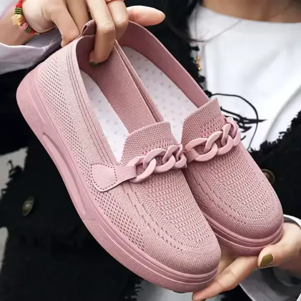 A person holds a pair of pink Spring Shoes for Women featuring a knit texture and decorative chain detail on the front, highlighting stylish OEM ODM footwear choices.