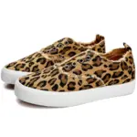 A pair of Hot Sale Casual Low Top No Lace Lazy Canvas Shoes for women, featuring a leopard print, white rubber soles, and random fluff decoration around the ankle.