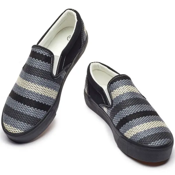 A pair of Fashion Ladies Comfortable Low Tops Stripe Printed Canvas Shoes with black soles and black, gray, and white striped uppers, displayed on a white background. Suitable for office wear and casual trendy outfits.