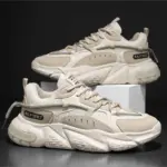 A pair of beige and white FA1987 and ESK-1987 chunky summer mesh sneakers with thick anti-slip PU rubber soles, ideal for men's outdoor sports. Factory wholesale OEM/ODM customization available.
