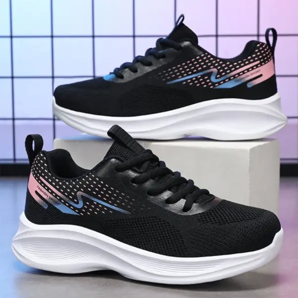 A pair of 2024 Custom Mesh Sneakers Sport Women Running Shoes, black with white soles and blue and pink accents, are displayed on a gray grid-patterned surface. Fashionable, breathable sneakers for women and ladies.