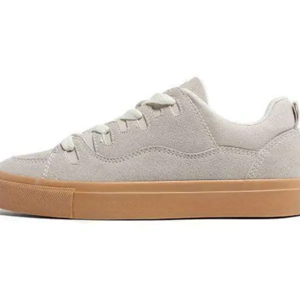 A side view of the Customizable Retro Mixed Stylish Plush Walking Sneakers for women shows their beige suede, lightweight design with white laces, a light brown rubber sole, and highlights OEM/ODM versatility.