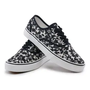 A pair of 2025 Factory New Style Mixed Trendy Adult Canvas Shoes for women, featuring black laces and a black-and-white abstract pattern on the fabric upper, displayed against a white background.