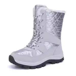 Wholesale Mountain Outdoor Hiking Wear Resistant Women's Snow Boots feature a TPR EVA thick sole, lace-up front, and quilted design—ideal for OEM/ODM customization. Shown in silver with a black treaded sole against a white background.