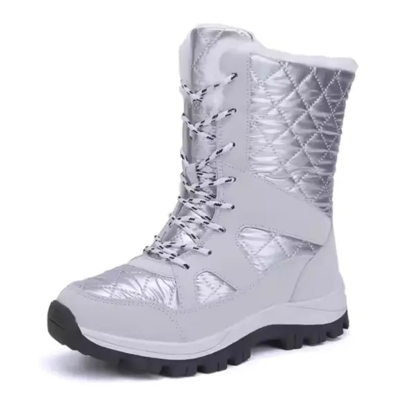 Wholesale Mountain Outdoor Hiking Wear Resistant Women's Snow Boots feature a TPR EVA thick sole, lace-up front, and quilted design—ideal for OEM/ODM customization. Shown in silver with a black treaded sole against a white background.