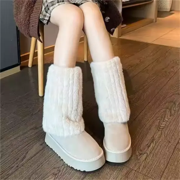 A person sits on a chair wearing a plaid skirt and cream-colored platform non-slip snow boots—Wholesale Winter New Styles Women Plus Plush Cotton Floette Plush Shoes for Ladies—on a wooden floor.