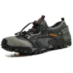 Gray and black OEM ODM Outdoor Hollow Mesh Hiking Shoes with anti-slip EVA rubber sole, toggle lace system, and "FASHOON" in orange on the side. Customizable wholesale water shoes with breathable mesh panels.