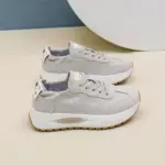 A pair of OEM ODM Durable Wearable Breathable Low Top Sneakers for women, in light gray with white soles and beige outsoles, "Guixing" on the sides, perfect for outdoor walking and customization, displayed on a neutral background.
