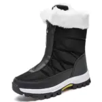 A black women's winter snow boot with thick white sole, front zipper, quilted design, and white faux fur trim—waterproof, available in plush large sizes for OEM/ODM customization to match your brand.