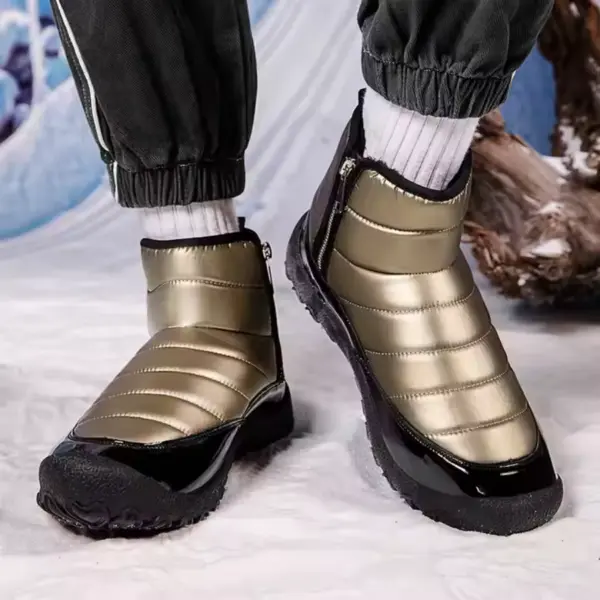 A person wears New Down Fabric Waterproof Snow Boots Men's Double Zipper Warm Outdoor Short Boots, featuring metallic gold color, black soles, and thick winter padding, paired with white socks and standing on snow-like ground.