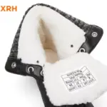 Wholesale anti-slip white winter snow boots for women, featuring a PU upper, lace-up design, and silver eyelets with faux fur lining—custom OEM/ODM designer shoes for 2025.