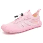A pink mesh upper athletic shoe with white accents, pull tab, and toggle laces—Customized Anti-slip Quick Drying Outdoor Shoes Flats—perfect for OEM/ODM needs.