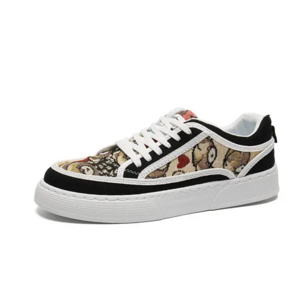 Wholesale Factory 2024 Rubber Embossing Canvas Shoes: Low-top men's sneakers with white laces, white sole, black trim, and a multicolored tapestry-style canvas upper. OEM/ODM custom design options available. Breathable and durable for sports wear.