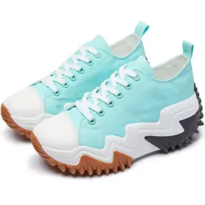 The XRH Wholesale mint green women’s sneakers feature white laces, white soles, and jagged brown and black rubber outsoles for a trendy walking style.