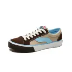 A brown, beige, and light blue low-top PU rubber canvas sneaker with white laces and sole, shown on a plain white background. OEM or ODM wholesale customization available for your brand’s unique style.