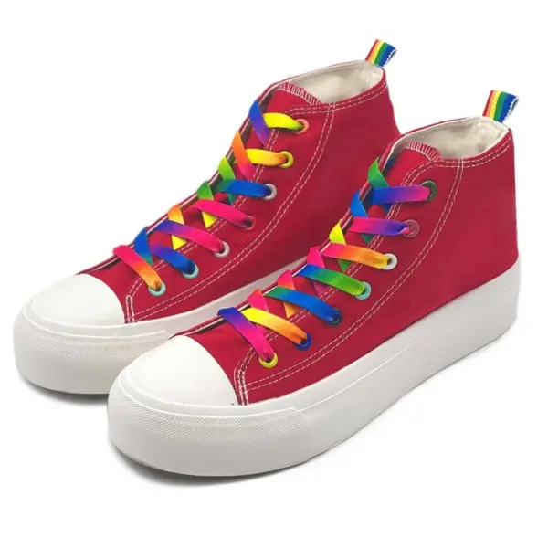 Custom Wholesale High Top rainbow lace-up canvas shoes with thick white soles, rainbow laces, and pull tabs—classic running rubber flats available for OEM/ODM customization.
