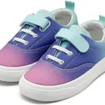 The 2025 New Solid Anti-slip Buckle Canvas Shoes are breathable, comfortable running sports flats for kids—ideal for OEM/ODM orders seeking quality children's loafers.
