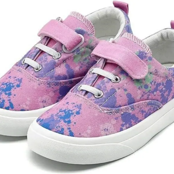 2025 New solid anti-slip buckle canvas sports flats for children in pink, featuring white soles, a purple and green splatter pattern, velcro strap over elastic laces—breathable and available for OEM/ODM orders.