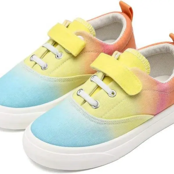 The 2025 New Solid Anti-slip Buckle Canvas Shoes offer breathable, colorful gradient style with blue, yellow, and pink hues, white soles, and yellow Velcro straps. Available for OEM/ODM customization to match your unique kid’s style.