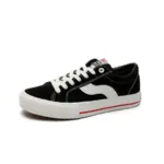 A customizable black low-top PU rubber canvas sneaker with white laces, wavy side stripe, and thick white sole with a red line—available for OEM ODM factory wholesale to suit your brand's unique style.