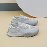 New Mesh Breathable Sports Sneakers: women's summer PU lace-up shoes with textured rubber soles, side logo, soft mesh uppers—ideal for OEM/ODM customization—shown on a beige floor against a wall.