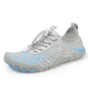 A light grey and blue minimalist children's outdoor beach shoe with a textured anti-slip sole and elastic toggle lacing, available for OEM/ODM customization.